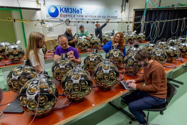 Nikhef employees at work on the construction of the KM3NeT detector spheres. Credits: Nikhef